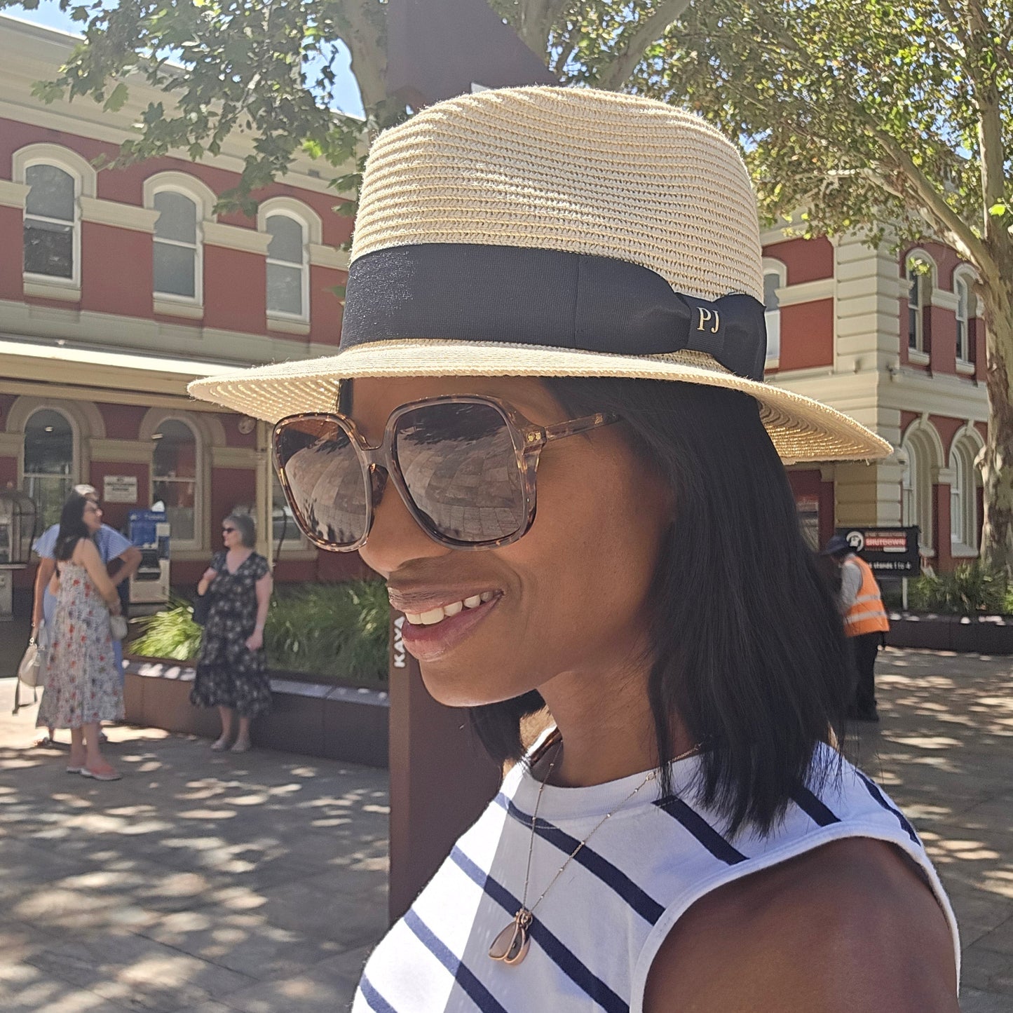 lady wearing panama hat holiday