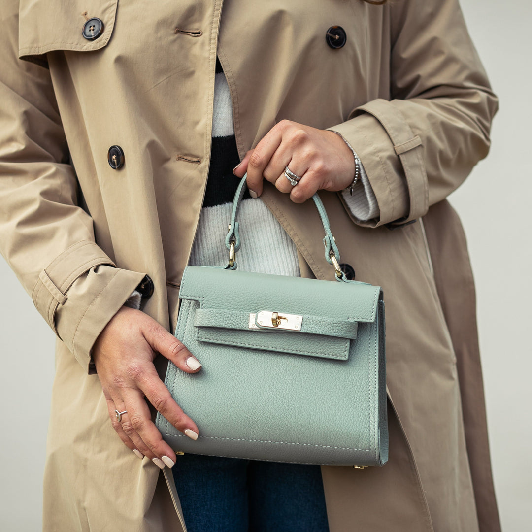 Holding sage grace leather top handle bag 