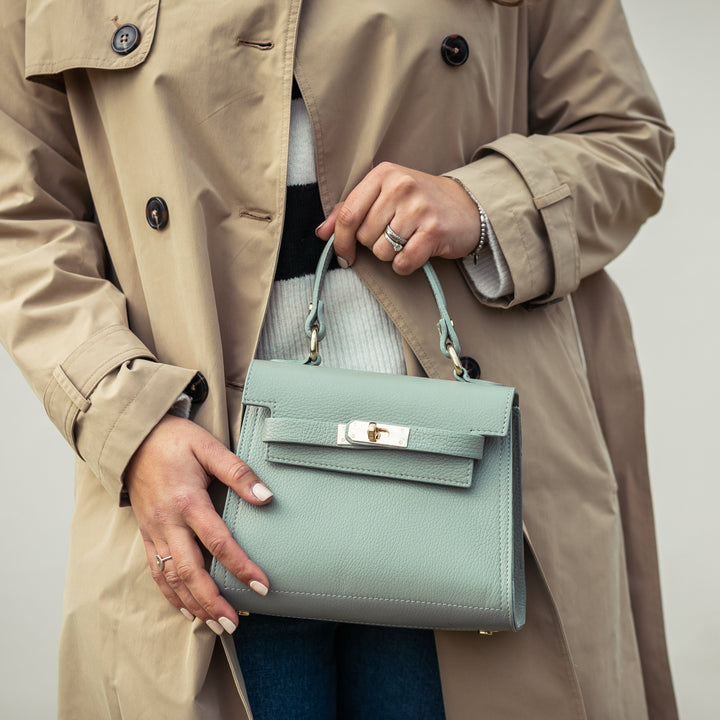 Holding sage grace leather top handle bag 