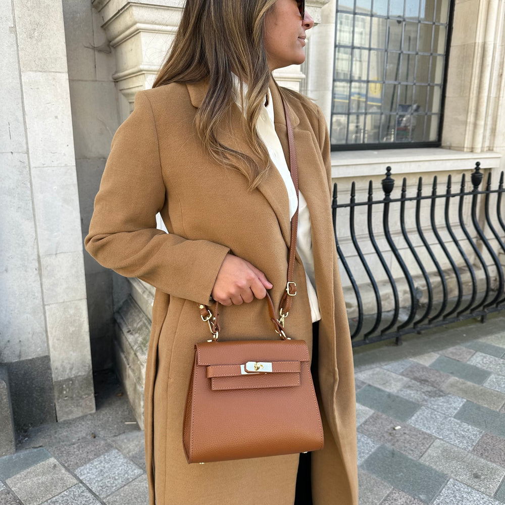 Tan Grace personalised leather crossbody bag worn over the shoulder