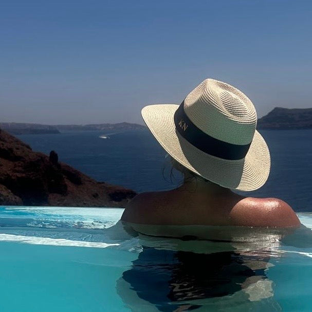 lady in sun hat straw fedora 