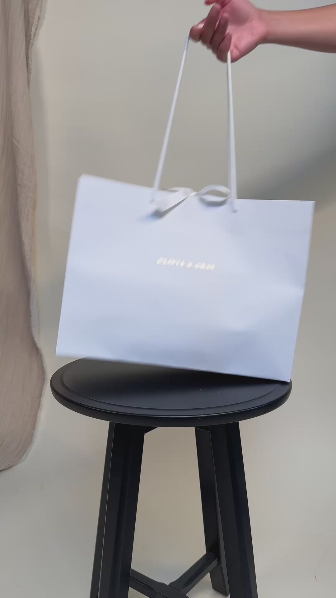 Load video: Unboxing a handbag